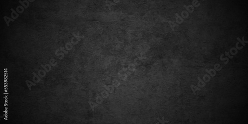 Black texture chalk board and black board background. stone concrete texture grunge backdrop background anthracite panorama. Panorama dark grey black slate background or texture. © MdLothfor