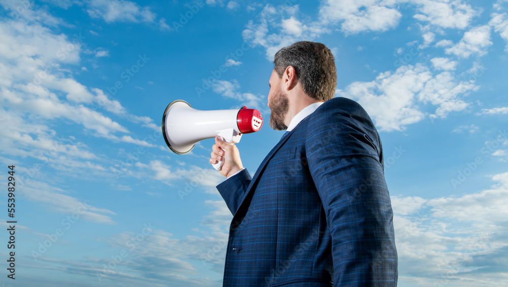 businessman announce in loudspeaker on sky background businessman announce in loudspeaker on sky background
