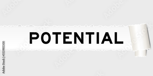 Ripped gray paper background that have word potential under torn part