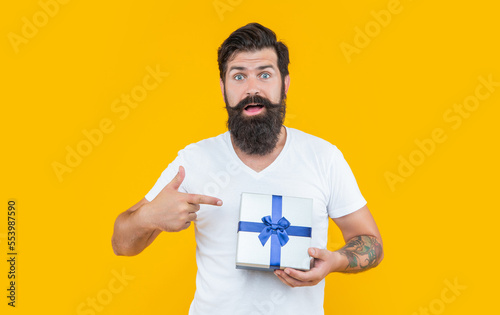 surprised man on birthday shopping. bearded man go shopping for birthday. man in studio © be free