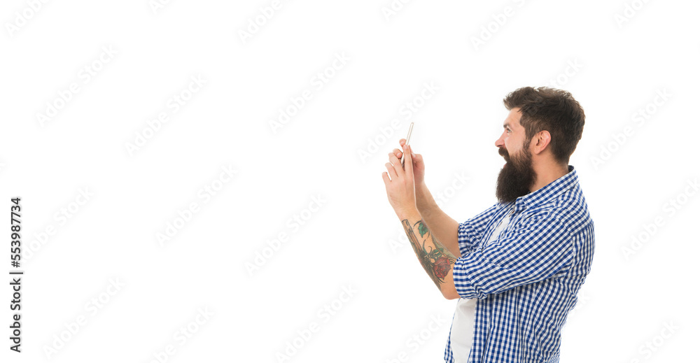 photo of surprised man maintaining blog. bearded man making photo for blog with copy space photo of surprised man maintaining blog. bearded man making photo for blog with copy space