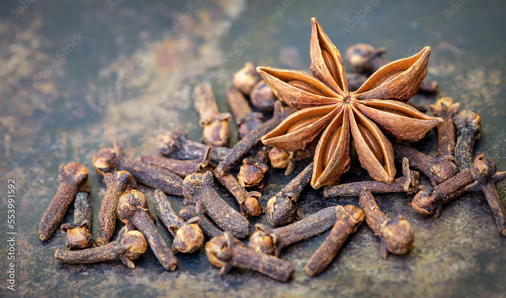Christmas decoration aromatic spices, cloves and star anise in the kitchen, holiday cooking banner Christmas decoration aromatic spices, cloves and star anise in the kitchen, holiday cooking banner