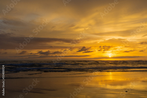 Seascape - sunset on the beach  waves  horizon. Top view. landscapeSeascape - sunset on the beach  waves  horizon. Top view. landscape. Parangtritis Beach  Yogyakarta