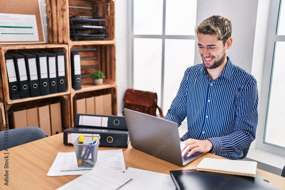 Young man business worker using laptop working at office