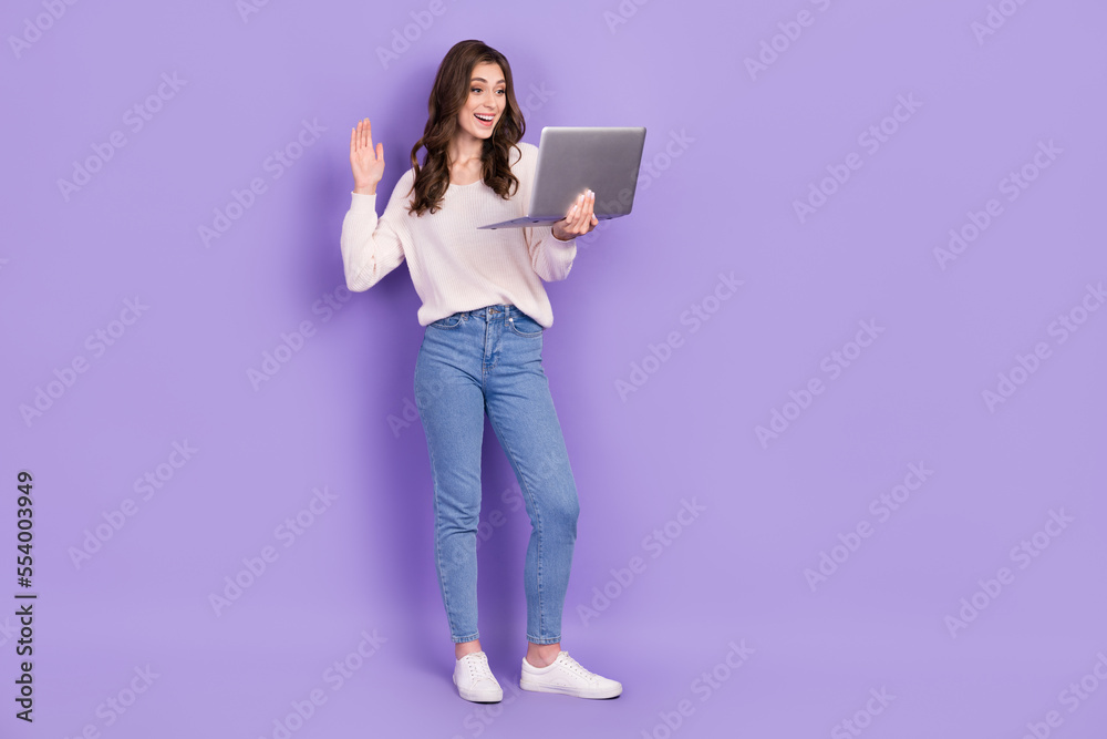 Full length photo of positive lady chatting friends pupils distance lesson class learning empty space isolated on purple color background Full length photo of positive lady chatting friends pupils distance lesson class learning empty space isolated on purple color background