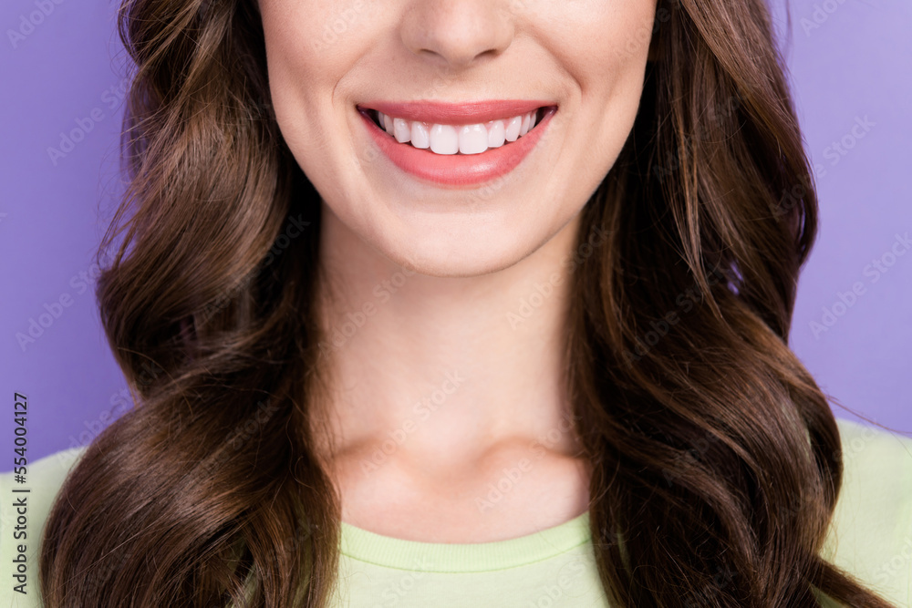 Cropped photo of young girl cavity oral protection healthcare hygiene after whitening teeth stomatology isolated on pastel violet color background Cropped photo of young girl cavity oral protection healthcare hygiene after whitening teeth stomatology isolated on pastel violet color background