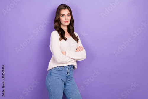 Photo of young confident successful crossed arms wear white jumper new denim jeans it specialist company owner isolated on purple color background