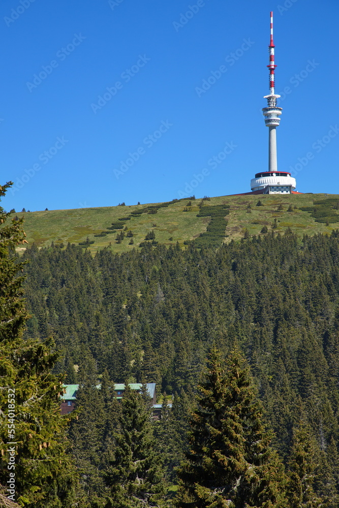 Obraz premium Telecommunication tower on the summit of Praded and mountain hut Barborka in High Ash Mountains,Nymburk District,Czech Republic,Europe 