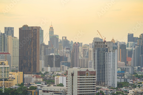 Aerial view of Bangkok Downtown Skyline, Thailand. Financial district and business centers in smart urban city in Asia. Skyscraper and high-rise buildings at sunset.