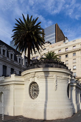 Vertical view of pretty baroque style building with oeil-de-boeuf windows, Santiago, Chile photo