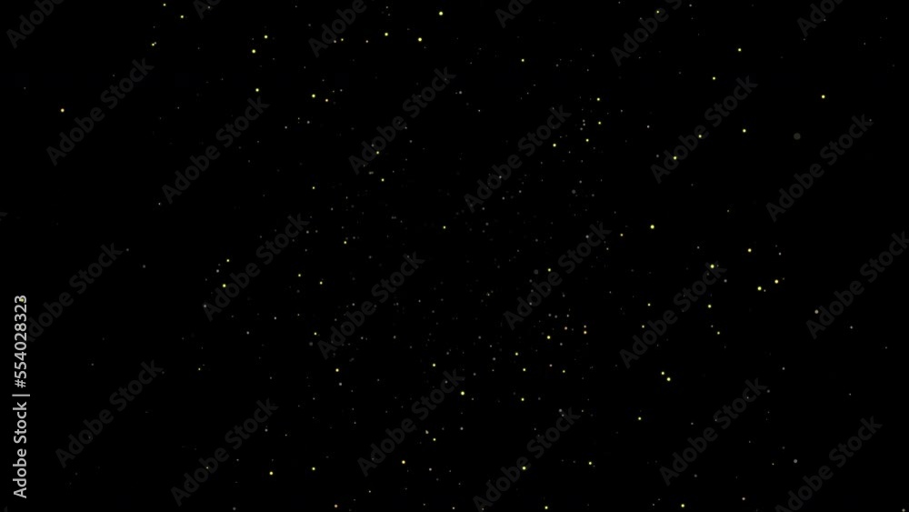 Abstract shiny golden particles flying towards camera
