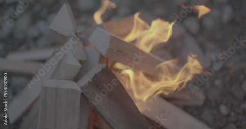 Bone fire detail with flames burning in slow motion from above scene 4K F-LOG video format