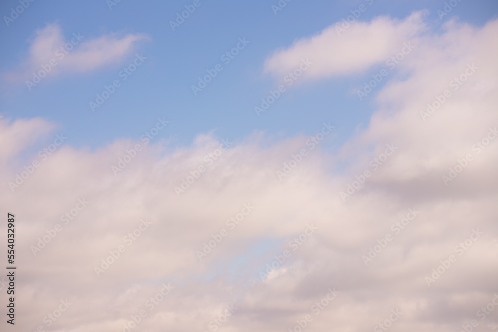 White clouds in the blue sky.