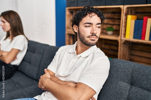 Man and woman couple arguing at home