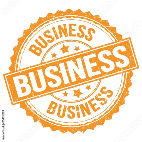 BUSINESS text on orange round stamp sign