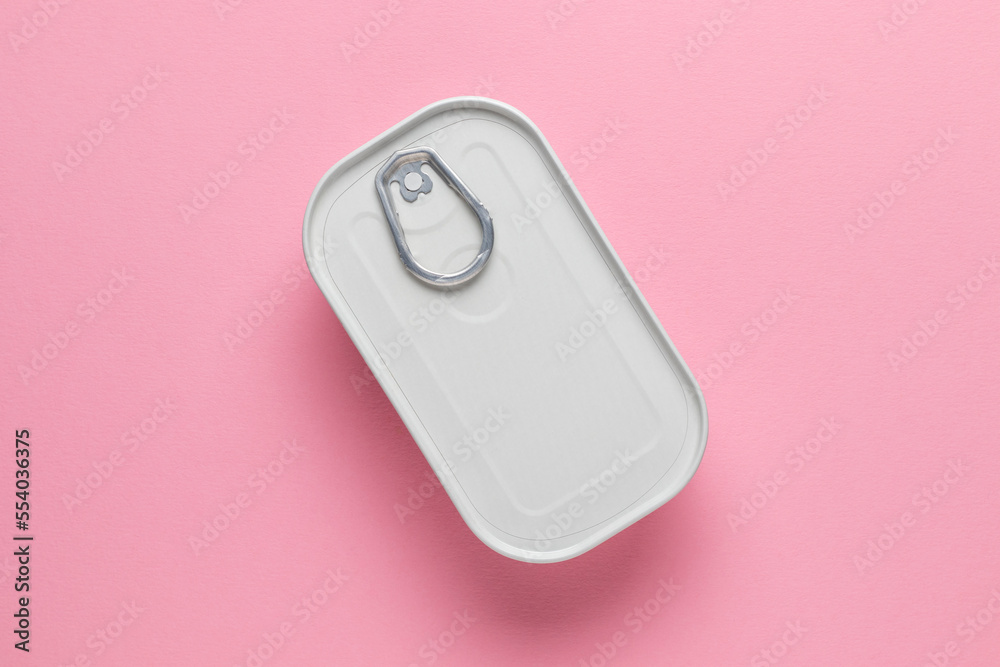 Canned food, top view. On pink background. Canned food, top view. On pink background.