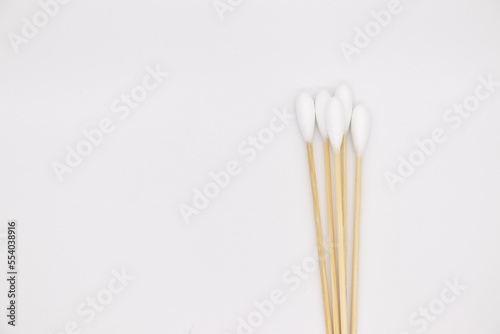 Cotton swabs on white background top view