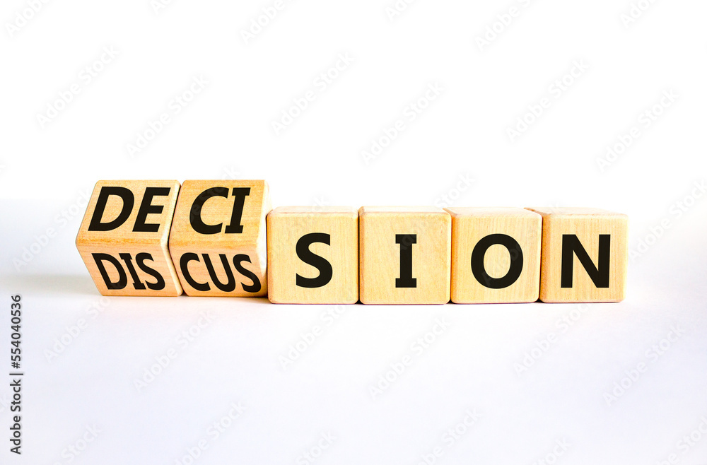 Discussion and decision symbol. Concept word Discussion and Decision on wooden cubes. Beautiful white table white background. Business discussion and decision concept. Copy space. Discussion and decision symbol. Concept word Discussion and Decision on wooden cubes. Beautiful white table white background. Business discussion and decision concept. Copy space.