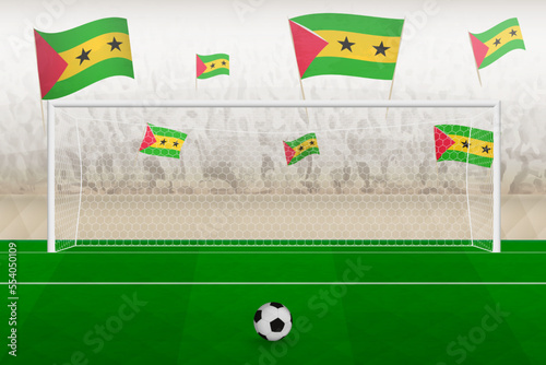 Sao Tome and Principe football team fans with flags of Sao Tome and Principe cheering on stadium, penalty kick concept in a soccer match.