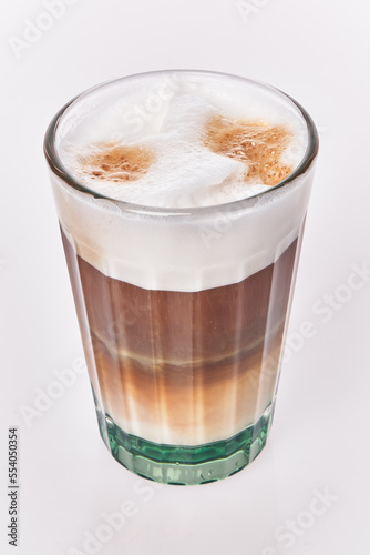  One glass of cappuccino coffee over white isolated background