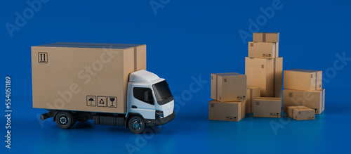Big cardboard box package on a white truck ready to be delivered