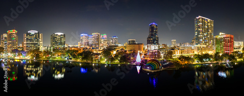 Wide panorama of downtown Orlando, Florida at night. December 2022. 