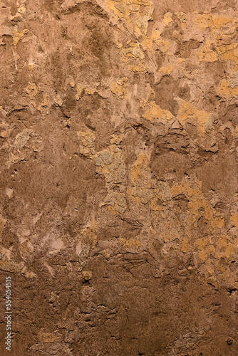 Background texture of wall with peeling plaster