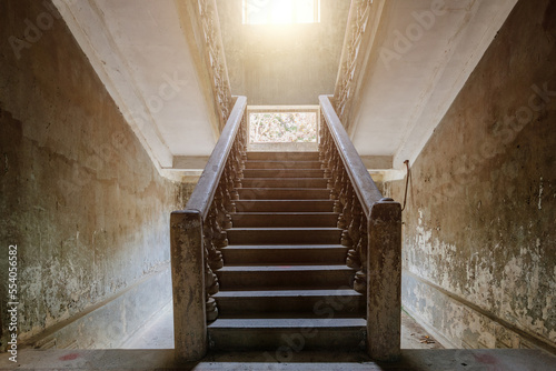 Old vintage staircase at the abandoned house or mansion
