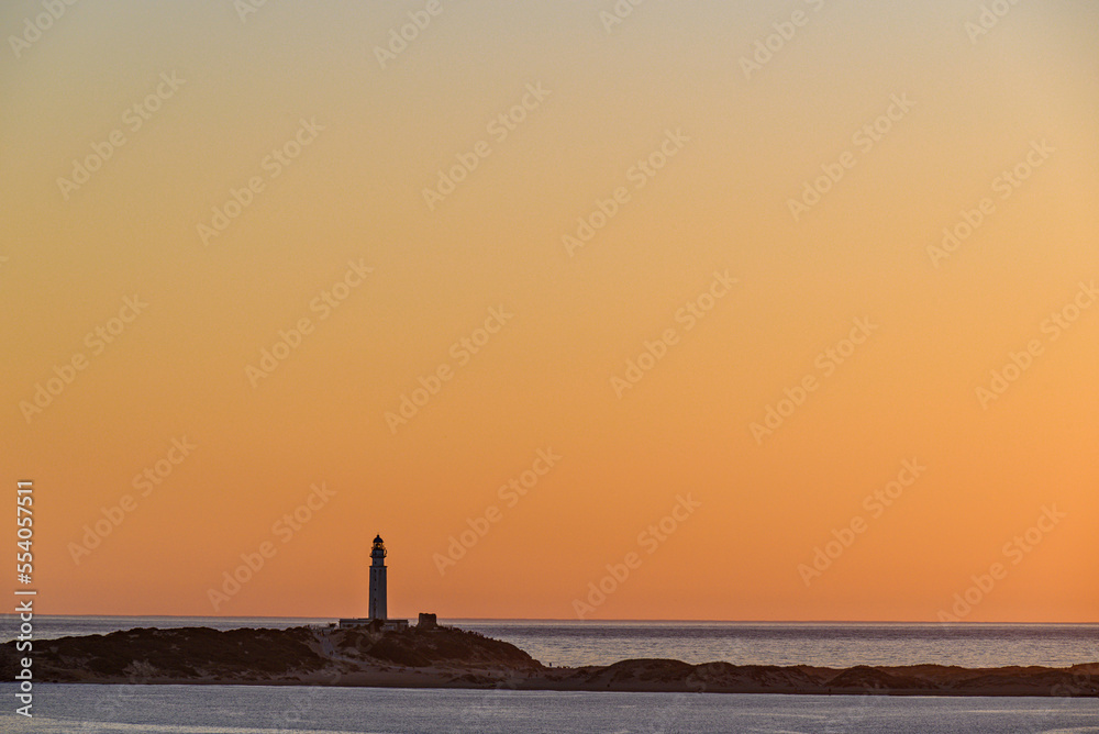 Beautiful sunset from the Trafalgar Lighthouse on the beach of Los Caños de Meca, Barbate, Cadiz