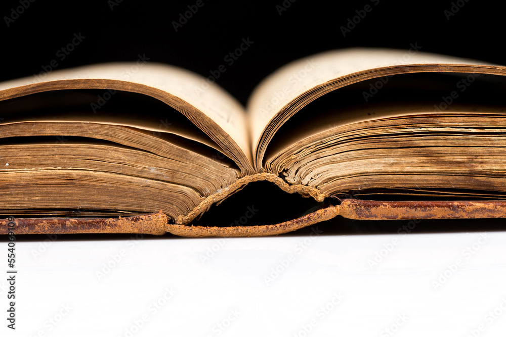 Fototapeta premium ancient book shot on black background