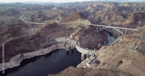 Hoover Dam in Nevada. Mountain and Colorado River in Background. Road and Bridge