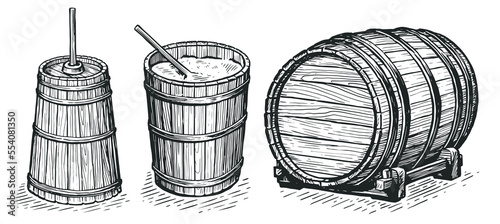 Wooden butter churn, bucket, barrel in vintage engraving style. Dairy food farm production concept. Sketch vector photo