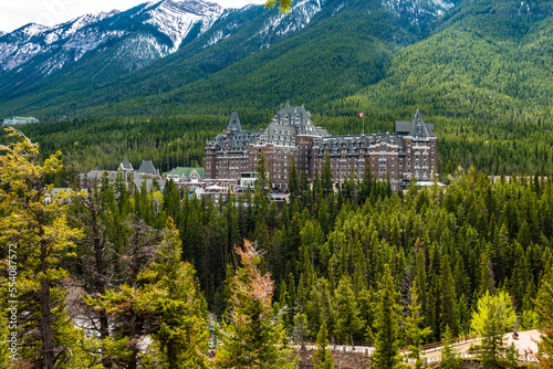 Fairmont Banff Springs amidst mountain greenery photo