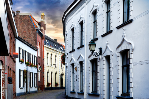 Narrow street in the city of Sittard, Netherlands photo