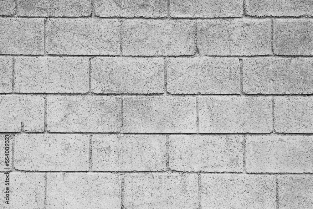 Texture of light grey brick wall as background Texture of light grey brick wall as background