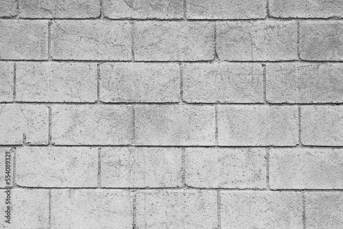 Texture of light grey brick wall as background