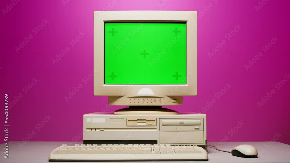 Retro pc with chroma key green screen, Old computer studio close-up, Desktop vintage retro wave display, late 90s PC mock up for 3d motion design and advertising. 