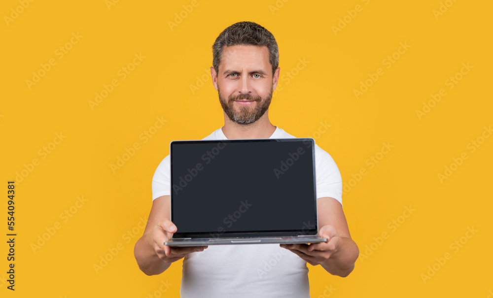 selective focus of man showing app on laptop. man showing app on screen with copy space. selective focus of man showing app on laptop. man showing app on screen with copy space.