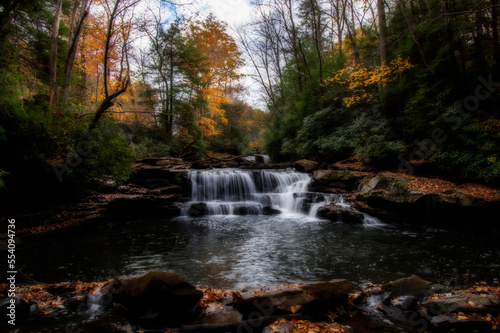 Fototapeta Naklejka Na Ścianę i Meble -  Waterfall in the fall small stream in the woods