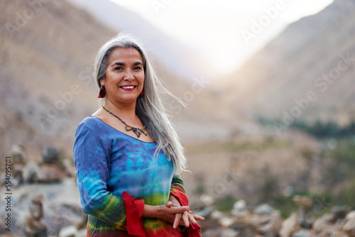 portrait of smiling artisan latina mid adult woman from mystical quiet place Cochiguaz, Valle del Elqui photo