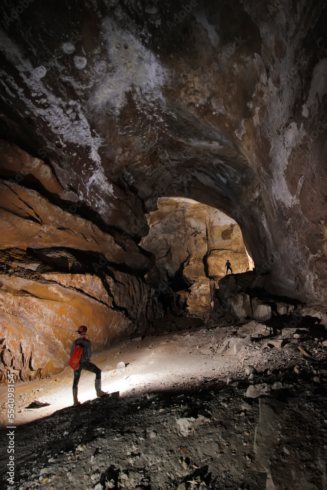 A Mulu Cave Project expedition member stands in Moon Cave in Gunung Benarat. A Mulu Cave Project expedition member stands in Moon Cave in Gunung Benarat.