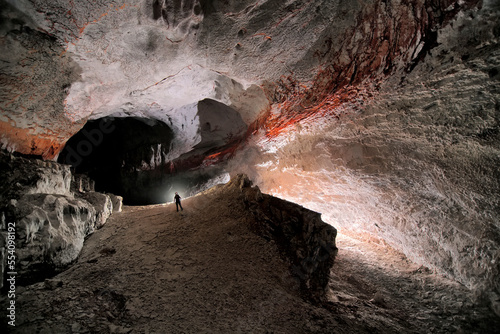 A Mulu Cave Project expedition member in the 1954 fossil passage in Whiterock Cave.