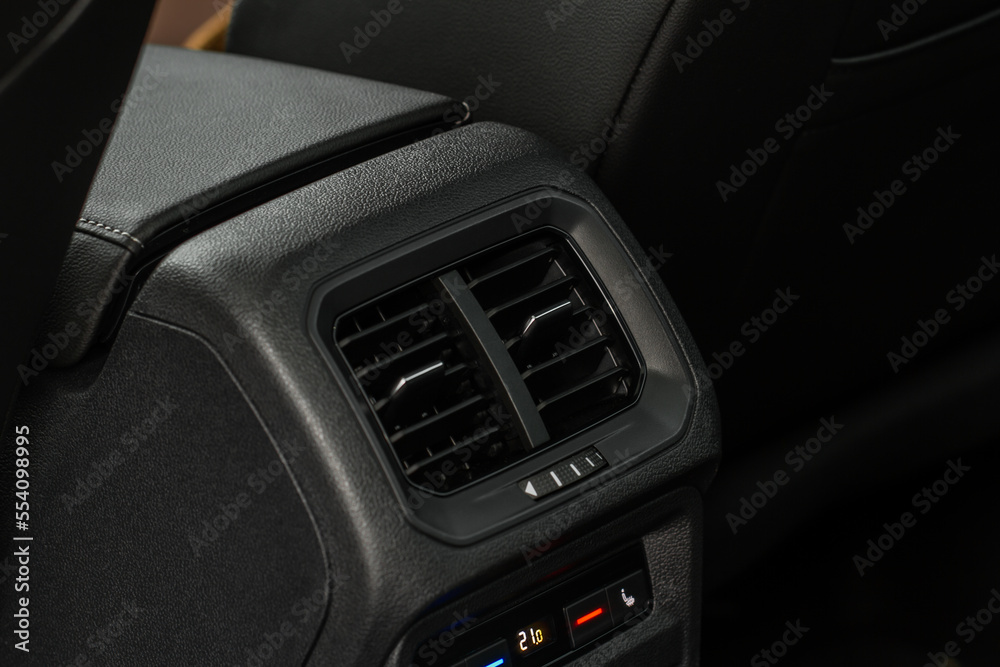 Car air conditioning close up view. The air conditioner flow inside the car. Detail interior of car. Air ducts.