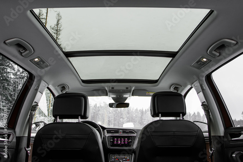 Panoramic sunroof in a car photo