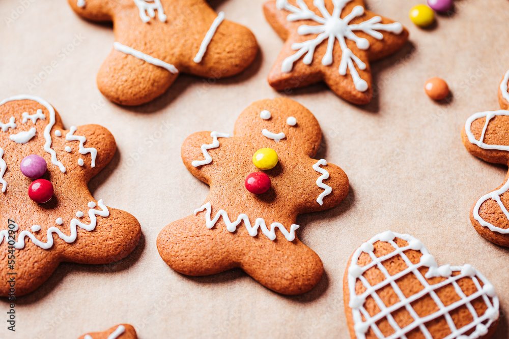 Various selection of Gingerbread cookies with sugar icing. Decorated in Christmas spirit. Happy New Year celebration. Playful and fun. Various selection of Gingerbread cookies with sugar icing. Decorated in Christmas spirit. Happy New Year celebration. Playful and fun.