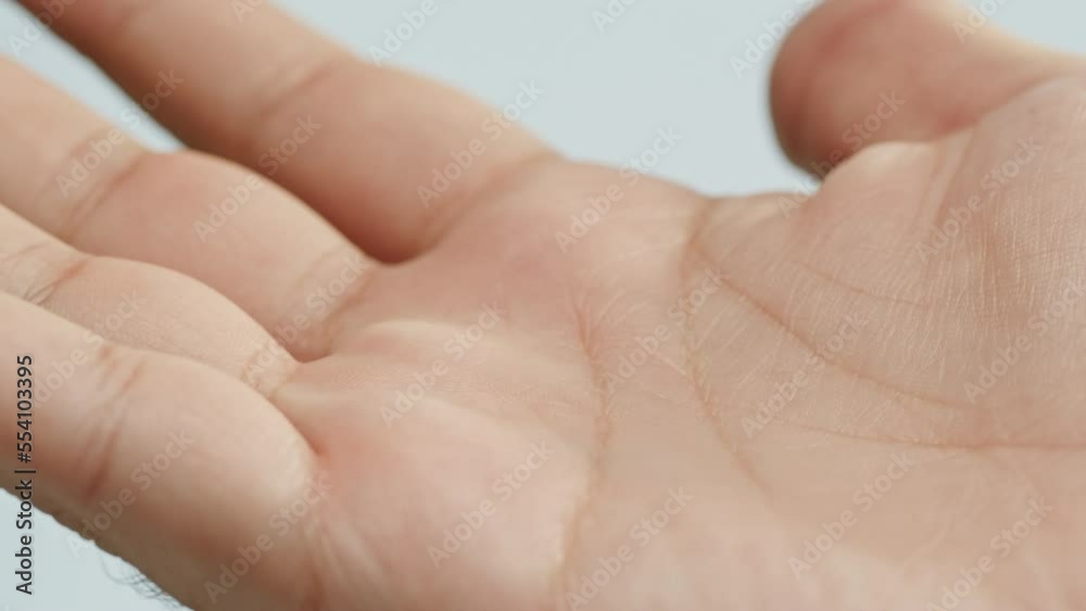 Human hand with lines, Palm reading, foretelling the future through the study of the palm, close up macro Human hand with lines, Palm reading, foretelling the future through the study of the palm, close up macro