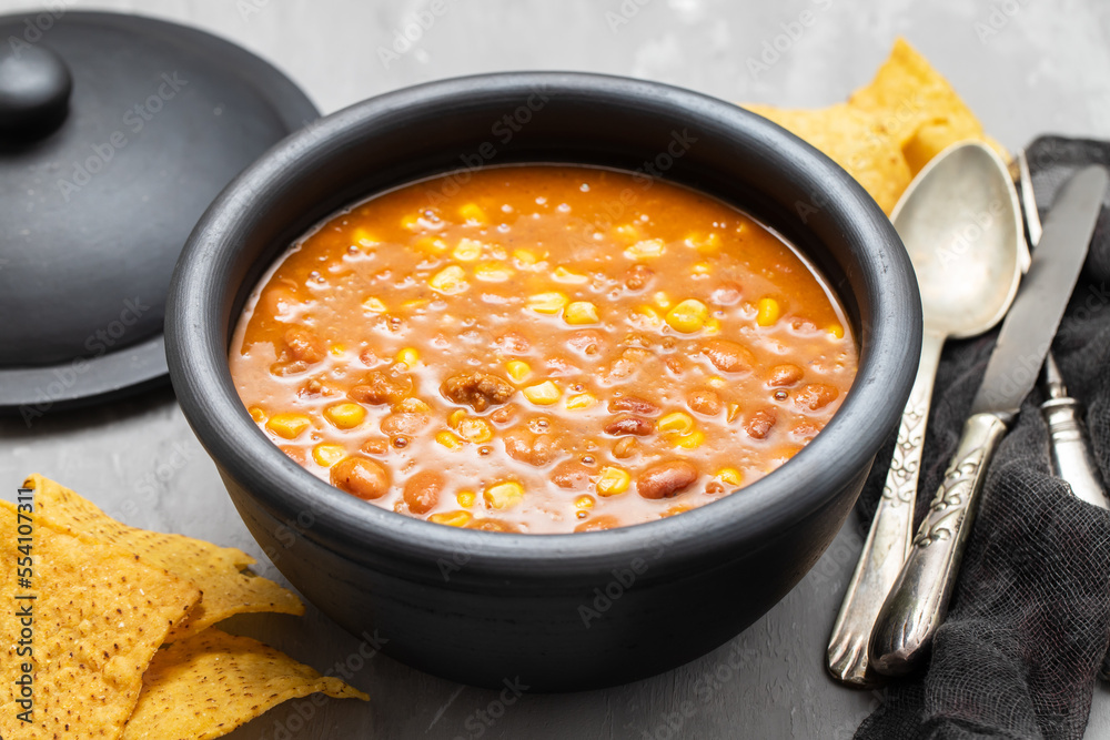 Mexican typical dish Chili Con Carne on black dish Mexican typical dish Chili Con Carne on black dish