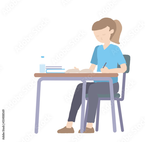female student at the desk studing
