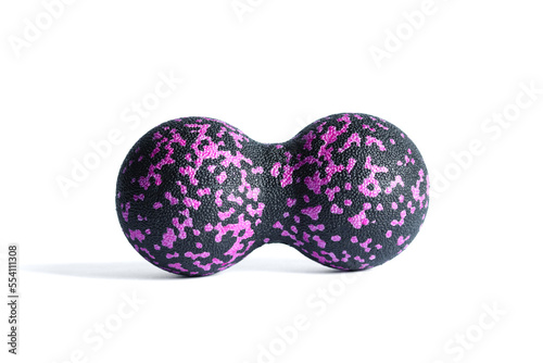 Black double ball or peanut ball massager with pink dots isolated on a white background. Fitness equipment. Concept of myofascial release.