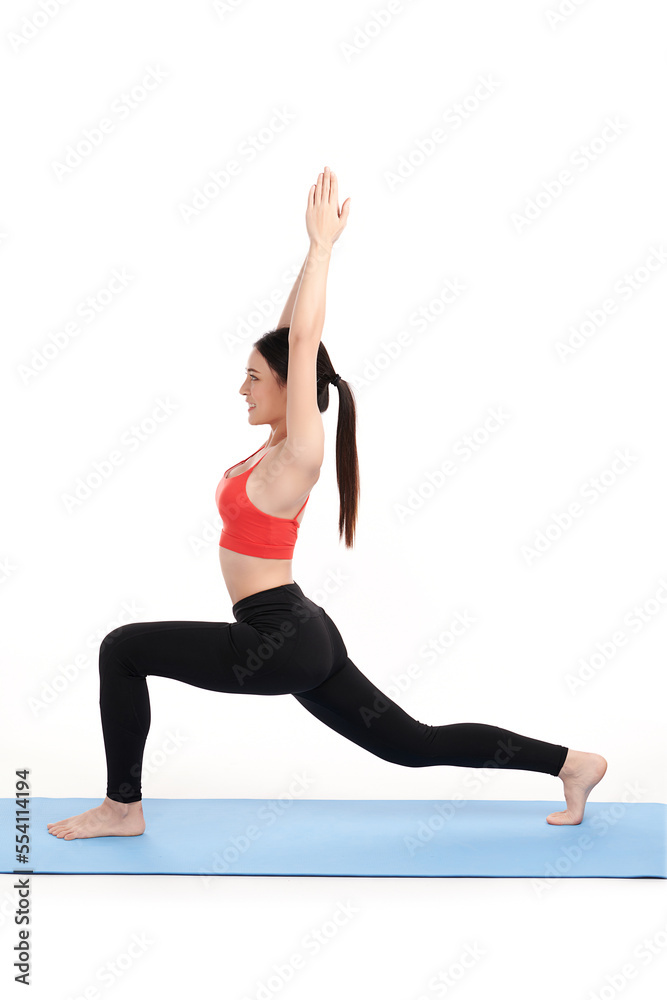 Sporty young asian woman doing yoga practice isolated on white background. Concept of healthy life and natural balance between body and mental development. Full length